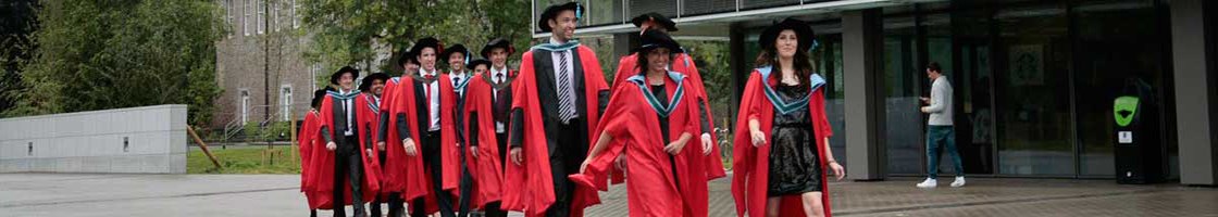 Conferring Outside the Library - Graduates Walking - Maynooth University