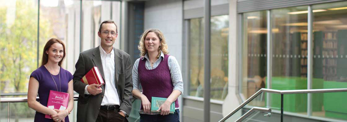 Nua Ghaeilge - Lecturers Holding Books- Maynooth University
