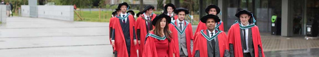PhD Procession - Graduates Walking Outside the Library - Maynooth University