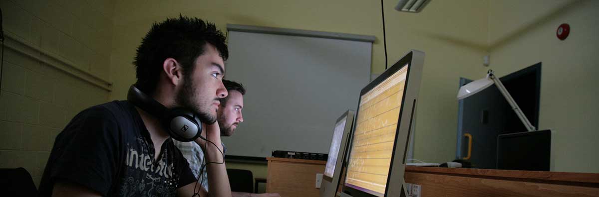 Postgraduate - Male Student Working on Computer - Maynooth University