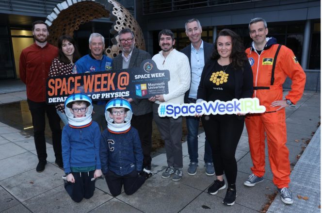 group of people posing for camera, red, blue, white, orange, black, Spacesuit