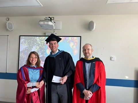 Jamie Mc Philips presented his Microsoft award by outgoing programme lead, Dr Zerrin Doğança Kucuk, with Dr Tom Delahunty.