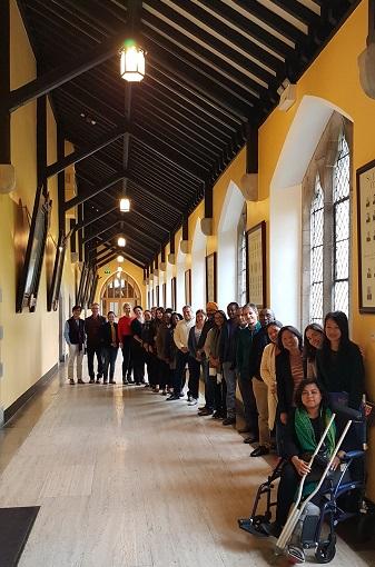 UNPRPD attendees lined up in cloisters at MU