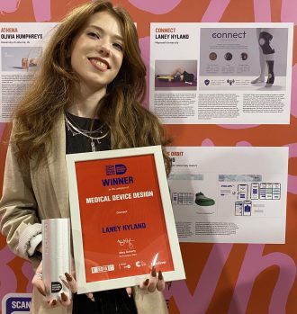 Image showing Laney Hyland with her IDI Graduate Award for Medical Device Design