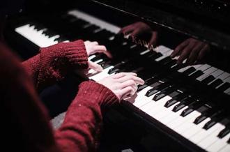 Music - Piano and Red Sleeves - Maynooth University