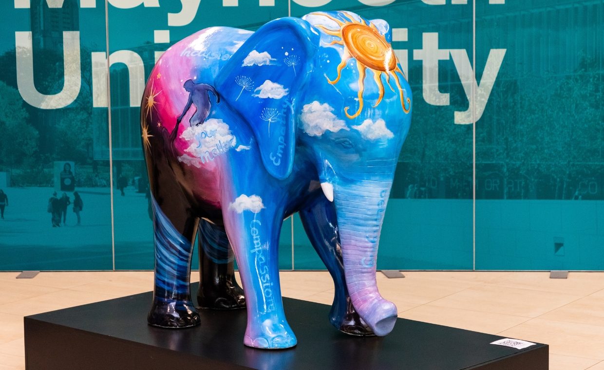 colourful Elephant mental health sculpture depicting Darkness into Light