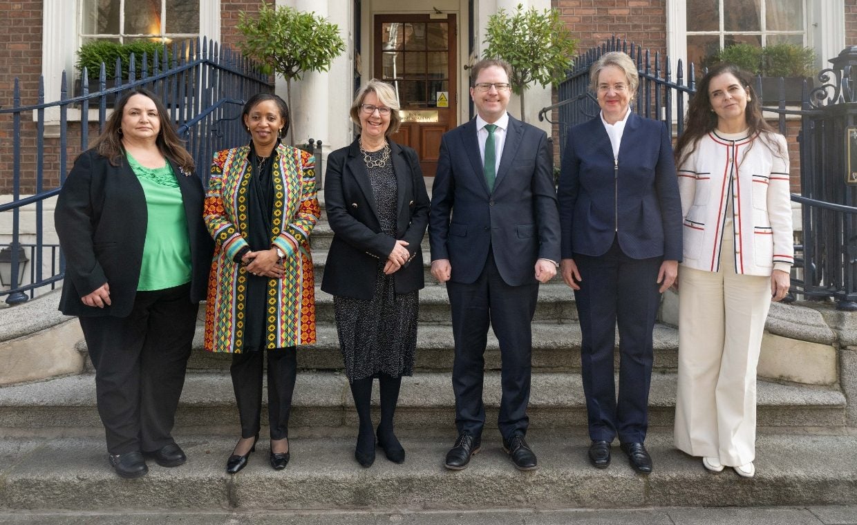 5 women and 1 man posing for picture outside Royal Irish Academy for International Women's Day