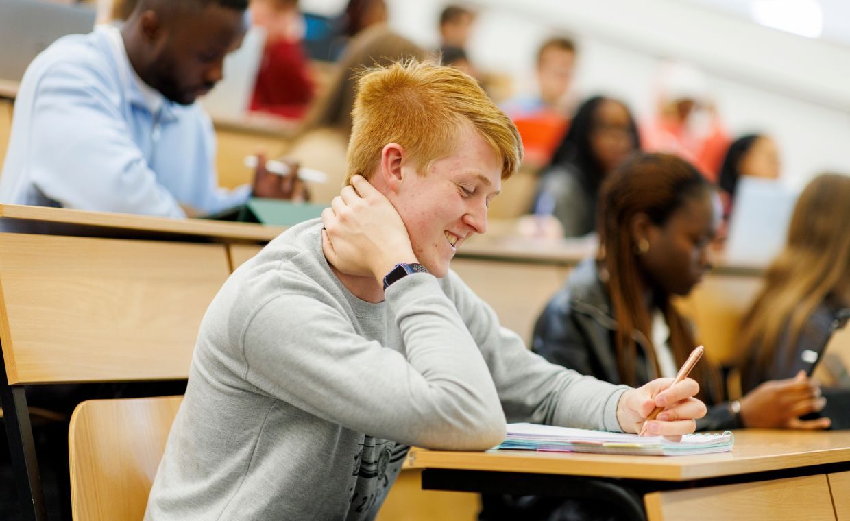 find your place homepage banner with student sitting in a lecture theatre