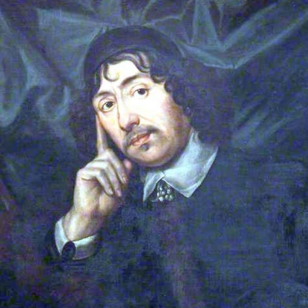 Man with curly black hair, dressed in dark blue 17th century clothing, sitting in a chair leaning his head on his hand