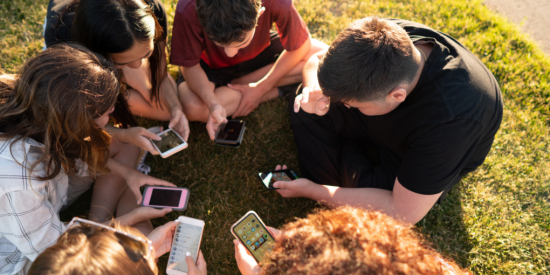 teenagers using mobile phones