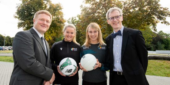 Erin McLaughlin and GAA scholar photographed with academic staff at the Business with Sport Science degree launch