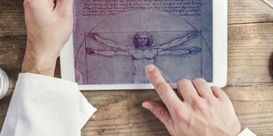 One had holding pic and another pointing at Da Vinci Vitruvian man