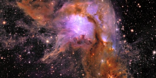 Black cosmos background with pink and orange nursery of star formation