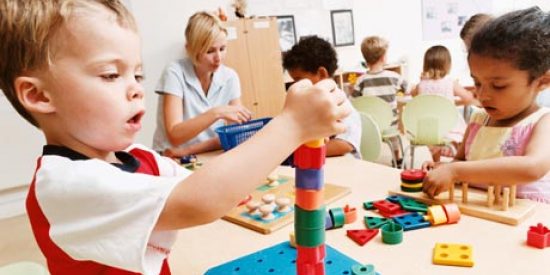 Froebel - Child playing with blocks- Maynooth University