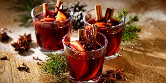 Three glases of red wine with oranges, cinnamon and star anise 