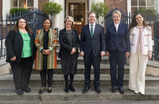 5 women and 1 man posing for picture outside Royal Irish Academy for International Women's Day